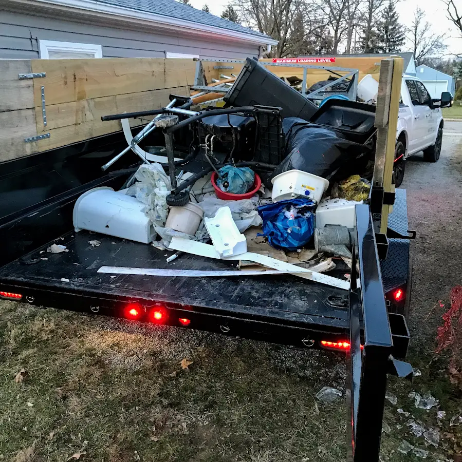 Roll-off dumpster delivered to a residential driveway in Hardin