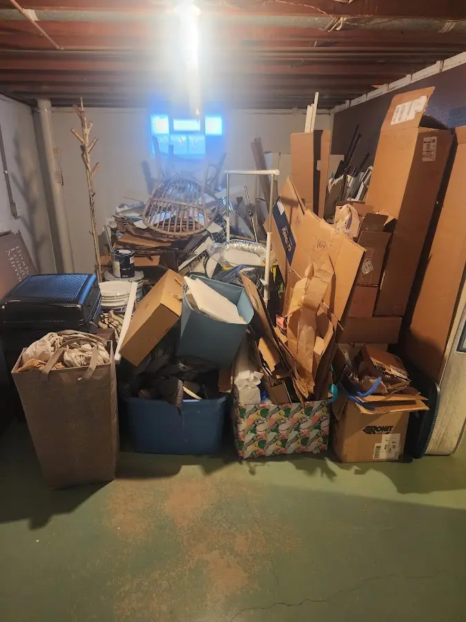 Roll-off dumpster container at job site for 6 Yard Dumpster Rental in Hardin